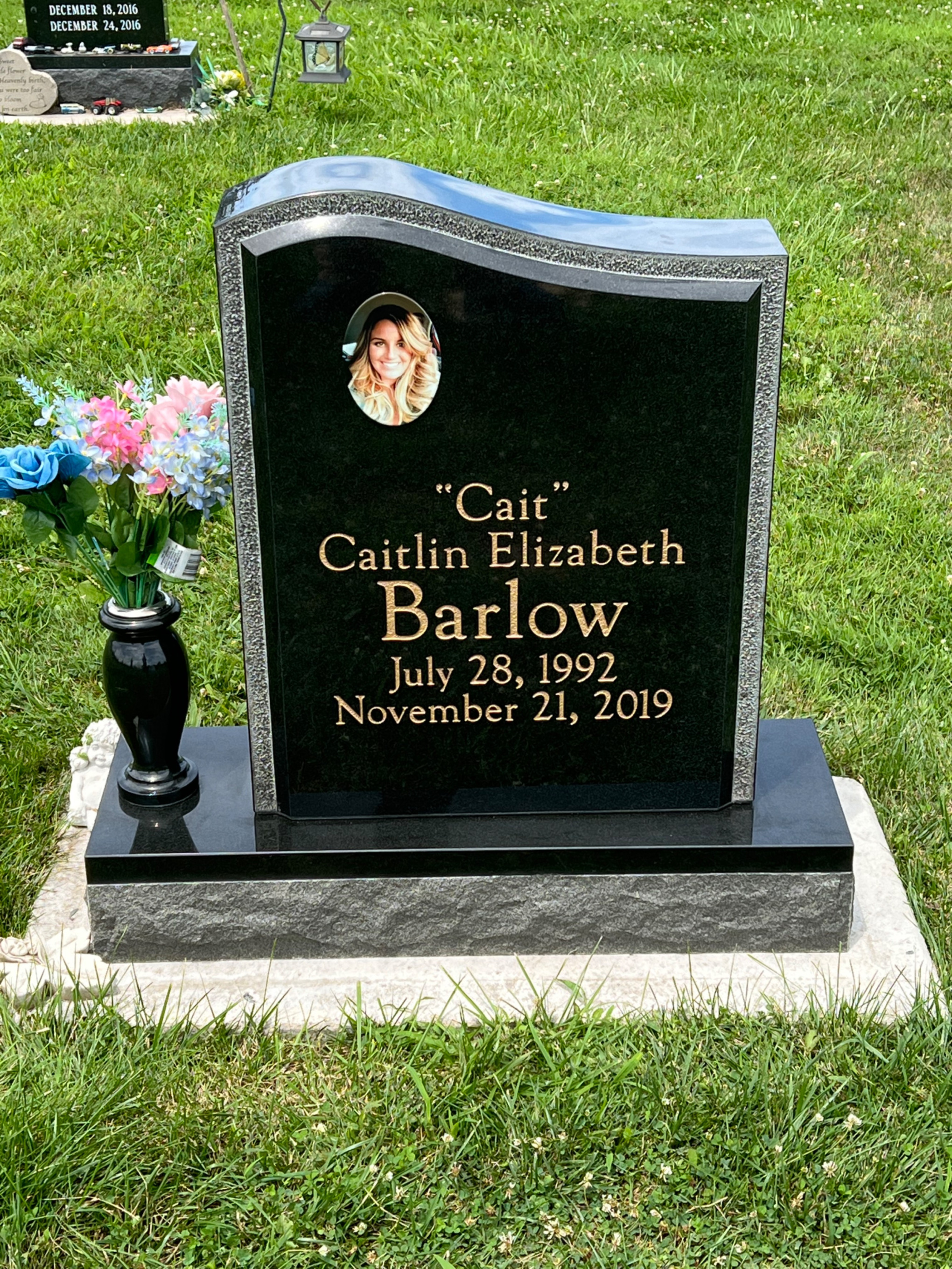 custom granite monument installed